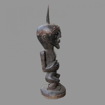 Belle statuette africaine Nkisi Songye ancien profil droit
